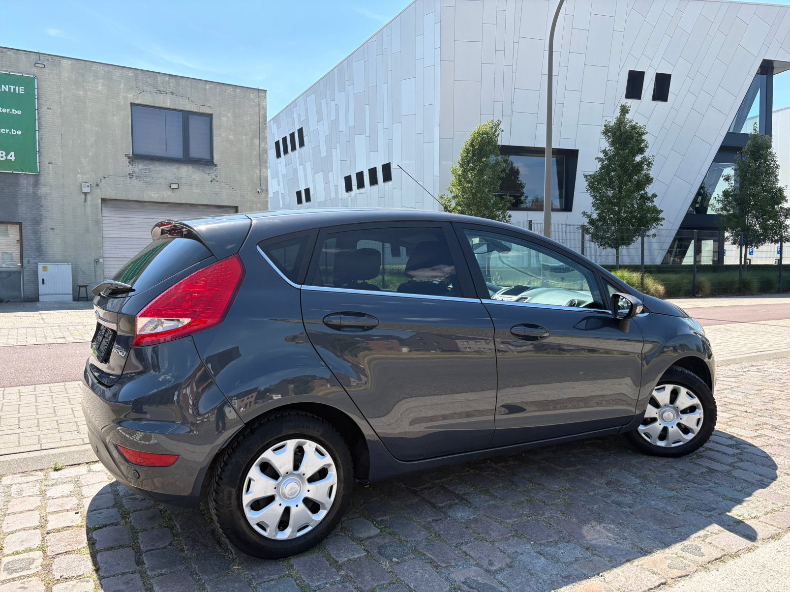 Ford Fiesta | 12 M Garantie | 117 Dkm | Benzine | 2012 |, Stof, Zwart, 4 cilinders, Spraakbediening