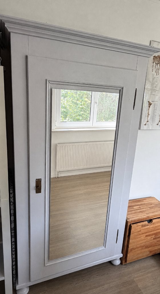 Mooie kledingkast met spiegel, Enlèvement
