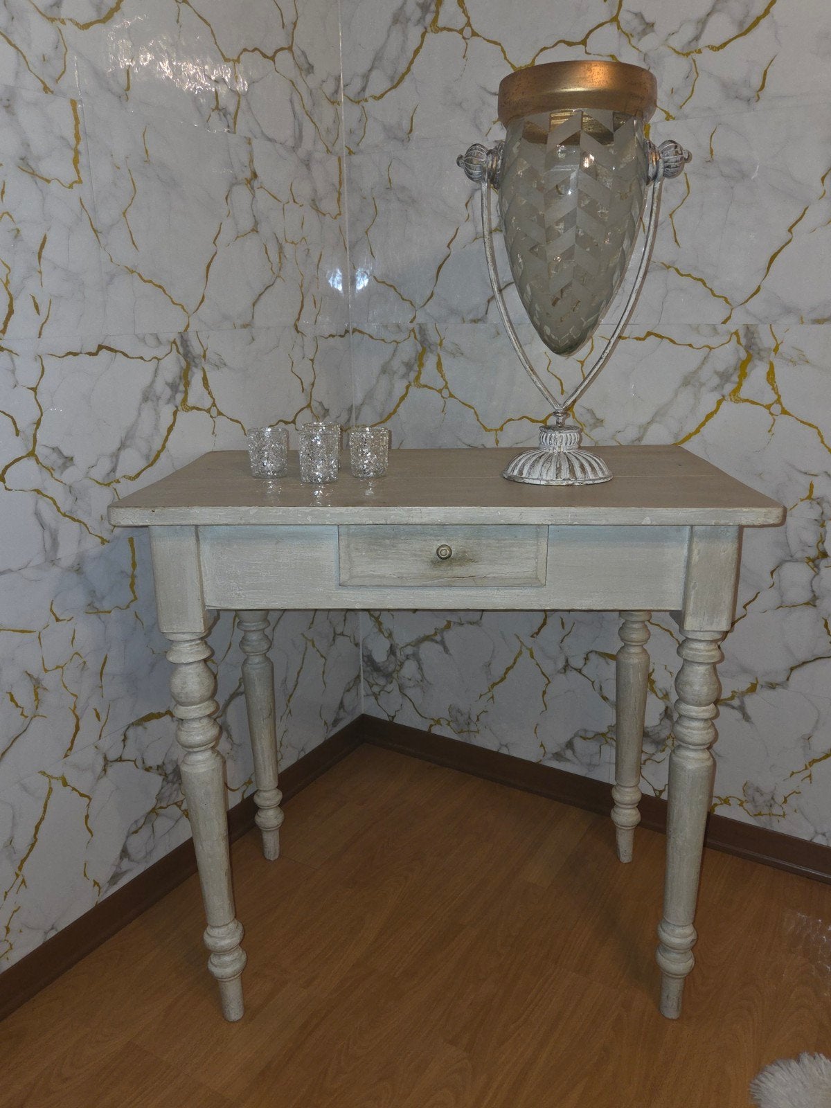 Muurtafel, Ophalen