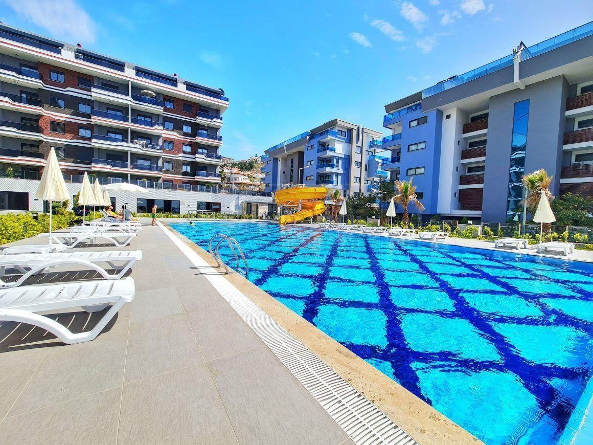 Appartement met prive tuin, Immo, Étranger