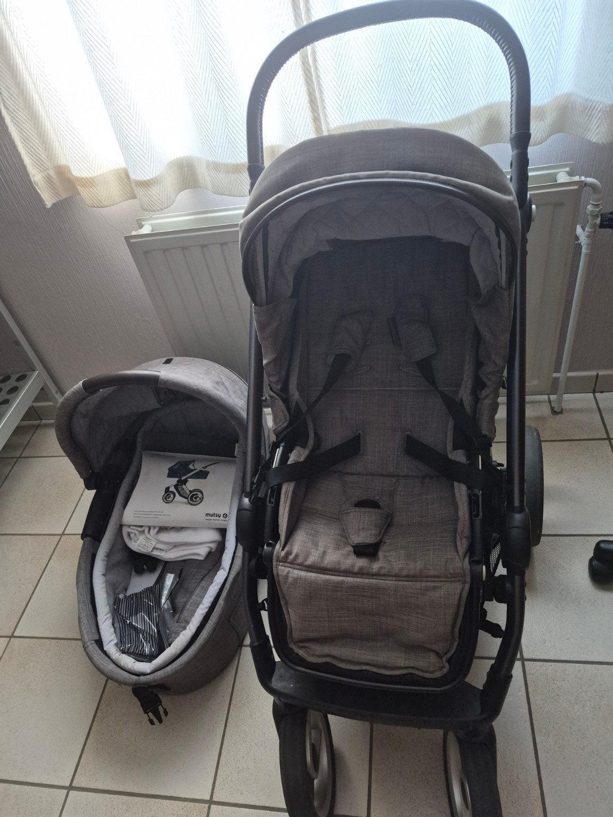 Kinderwagen met wieg en regenkap, Ophalen