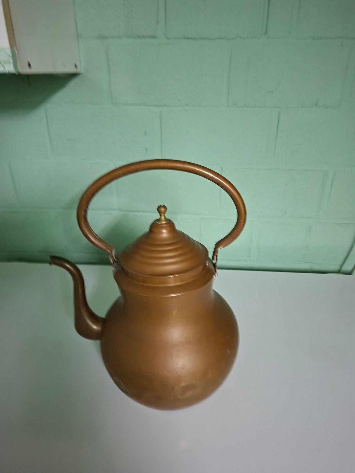 Een koperen ketel, Ophalen, Koper