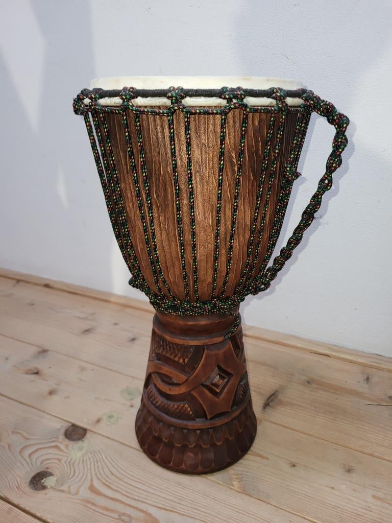 Afrikaanse trommel., Ophalen, Trommel