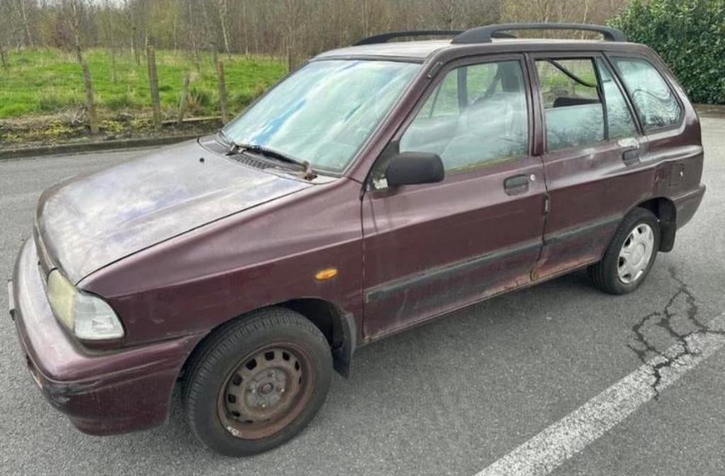 kia pride 1.3 benzine  28.645km   Bouwjaar 1999   47kw 65pk, Auto's, Kia, Cerato, Stof, Overige kleuren, 65 kW
