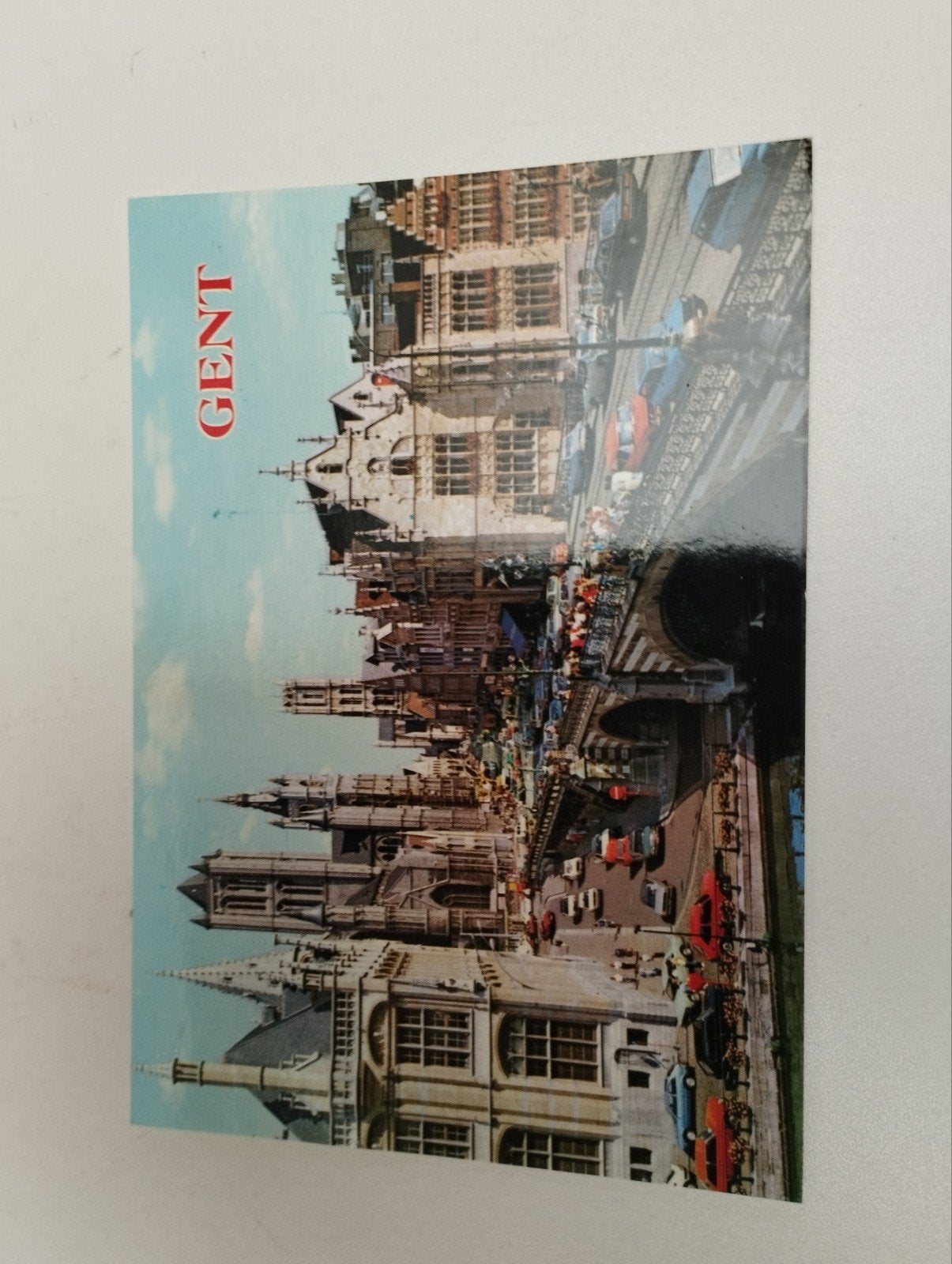 een postkaart over de stad Gent Belgie kleur verschillende k, Ophalen