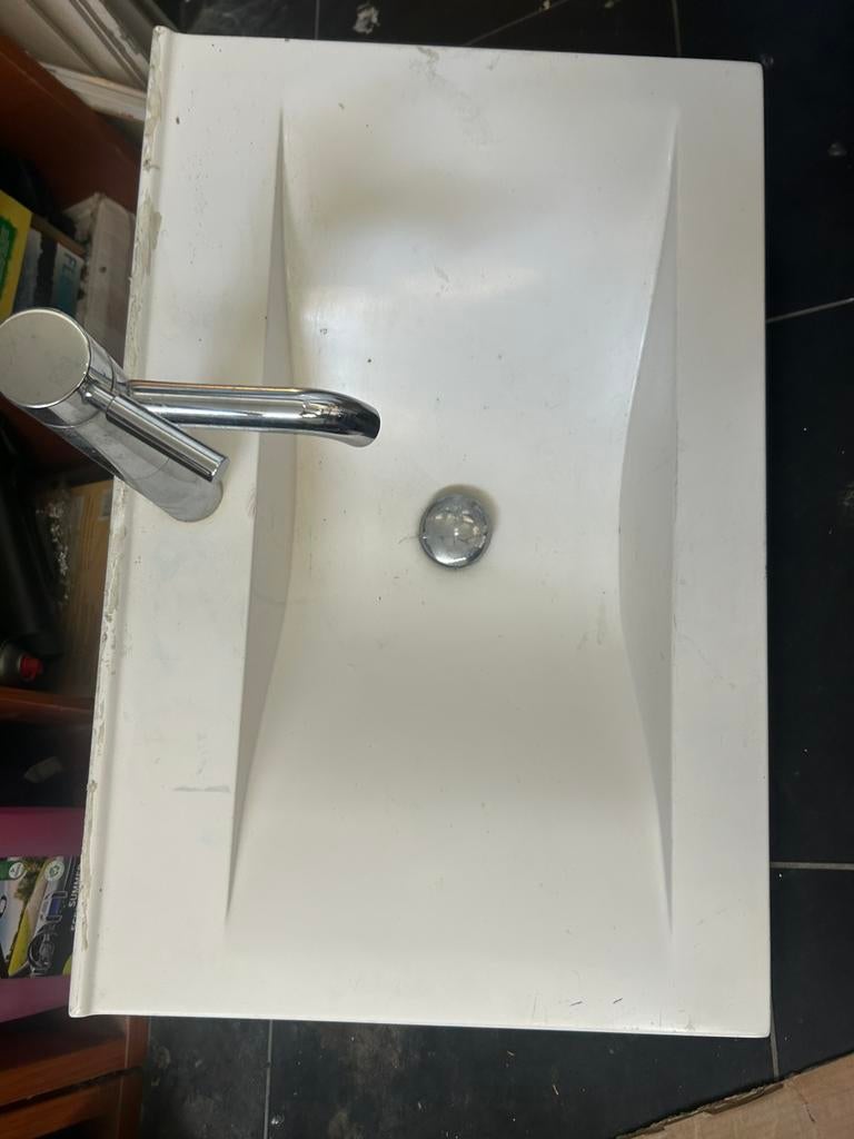 Witte wastafel, Ophalen
