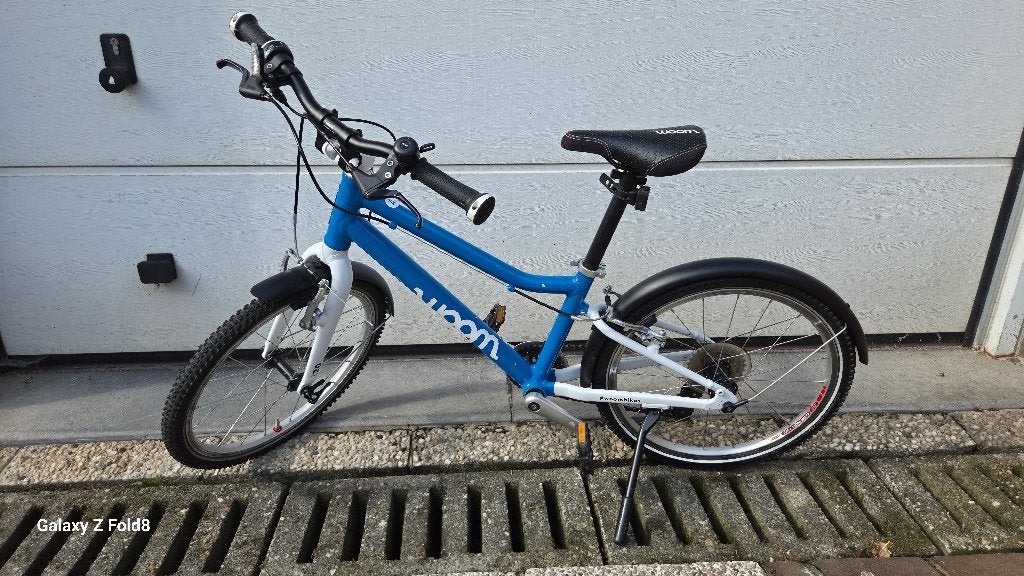 Woom 4 kinderfiets te koop, Fietsen en Brommers, Fietsen | Kinderfietsjes, Ophalen, 20 inch of meer, Gebruikt, Velgrem