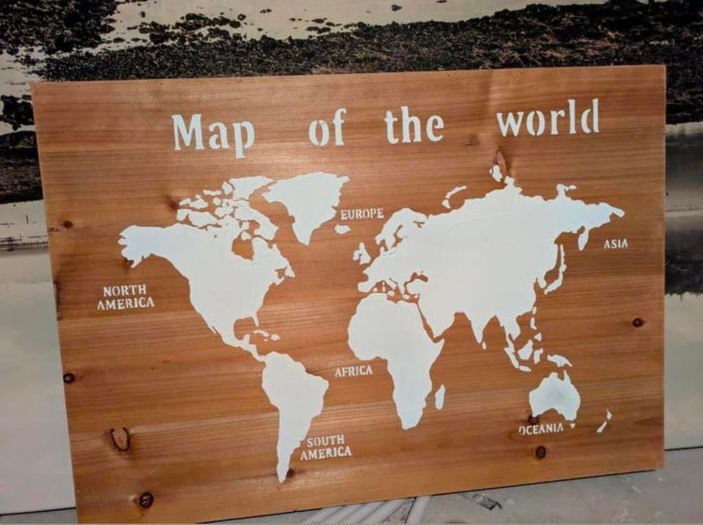 Wereldkaart op houten paneel (78 x 55 cm), Enlèvement