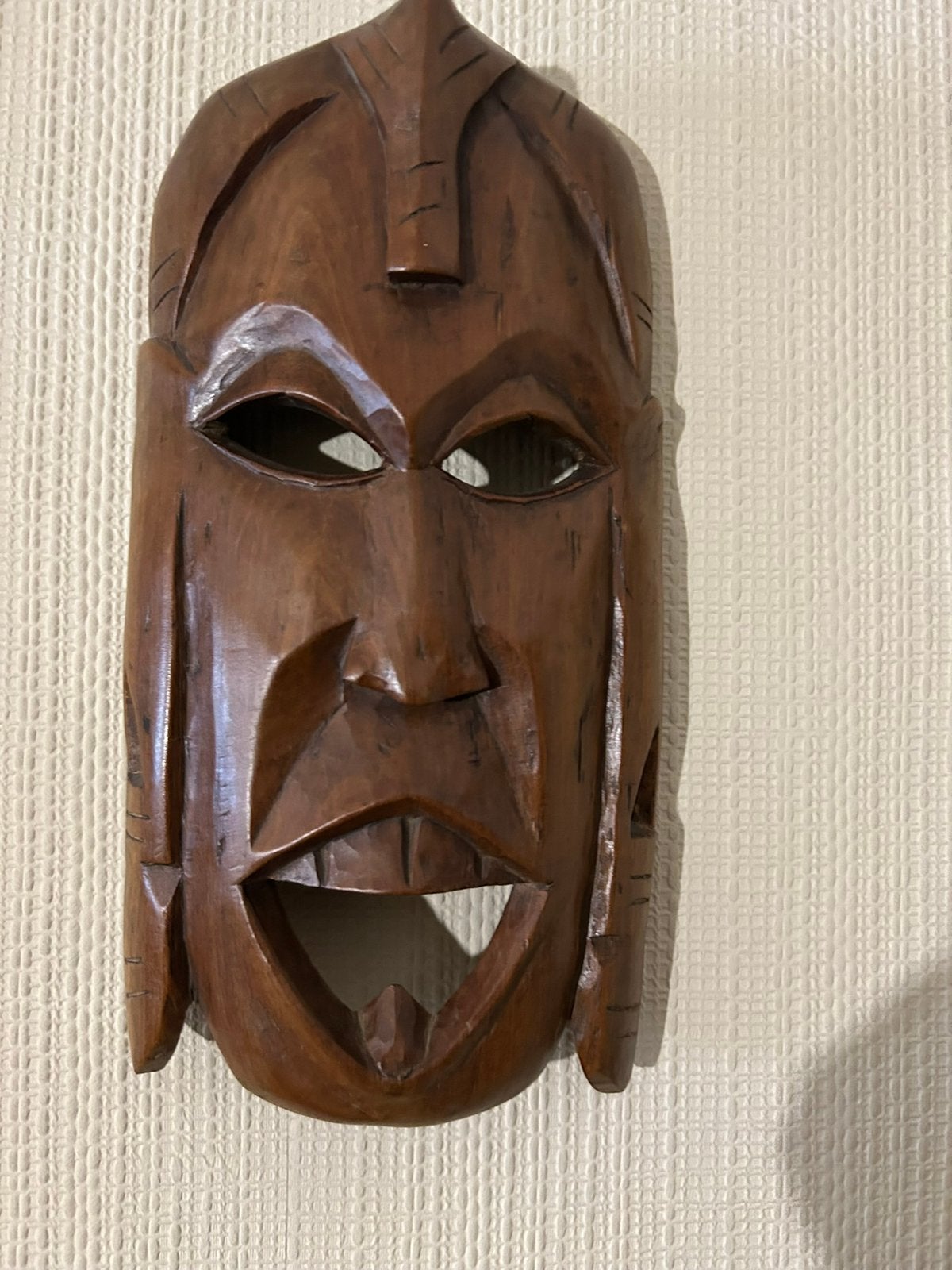 Klein Afrikaans masker, Ophalen, Masker