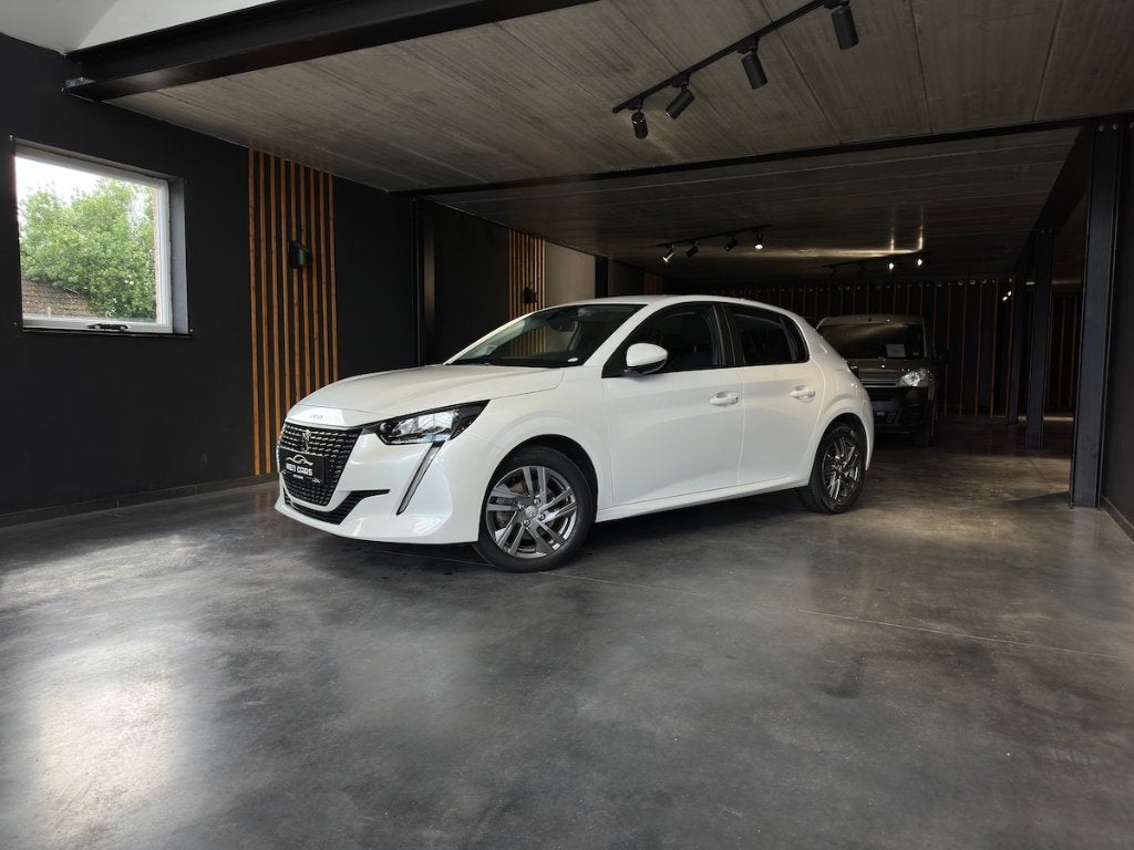 Peugeot 208 1.2i PureTech | Sensor | Cruise | Carplay | ..., Auto's, Stof, 1199 cc, Wit, Bedrijf