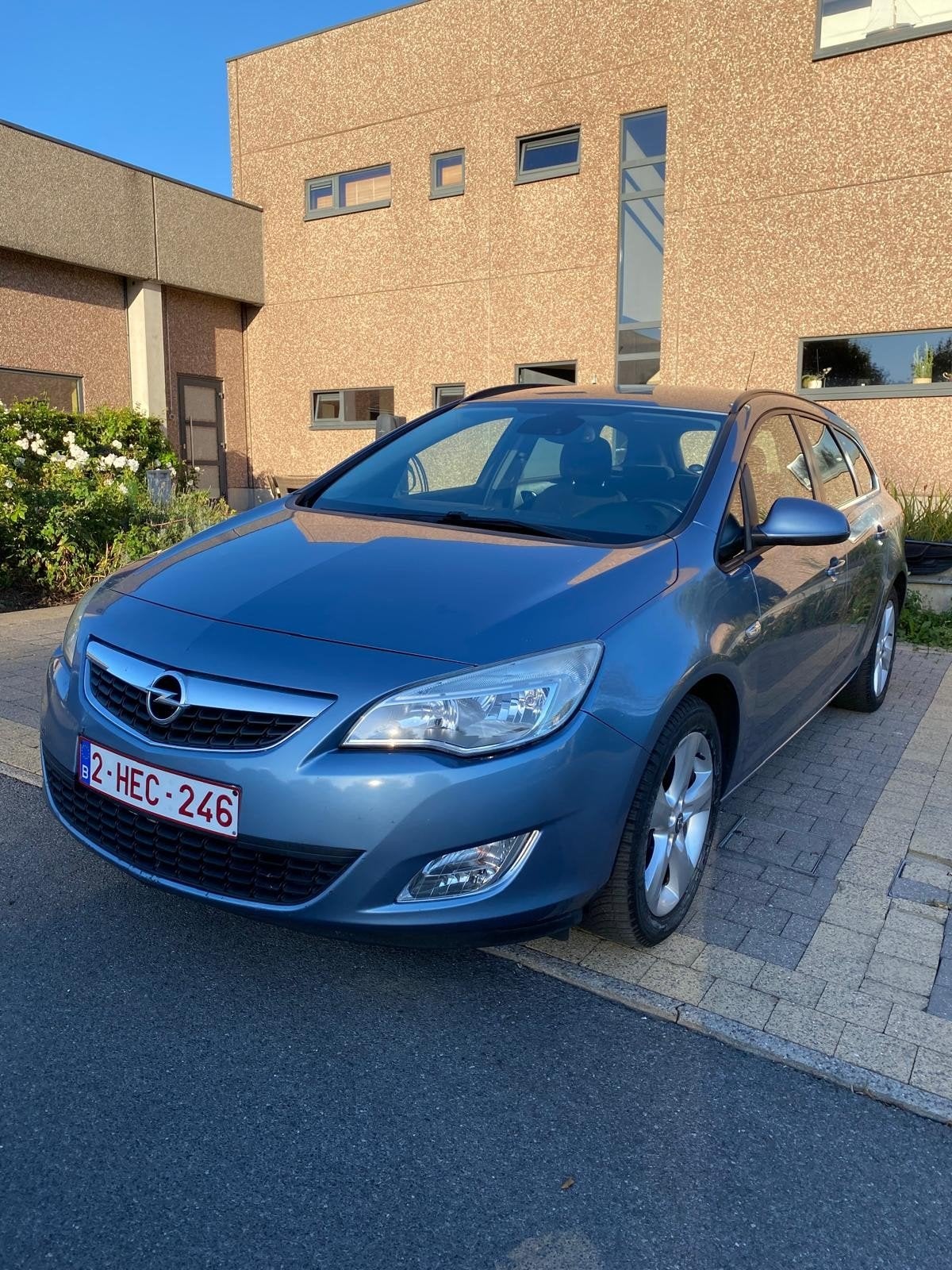 Opel Astra j euro 5 benzine, Auto's, Voorwielaandrijving, Euro 5, Stof, Blauw