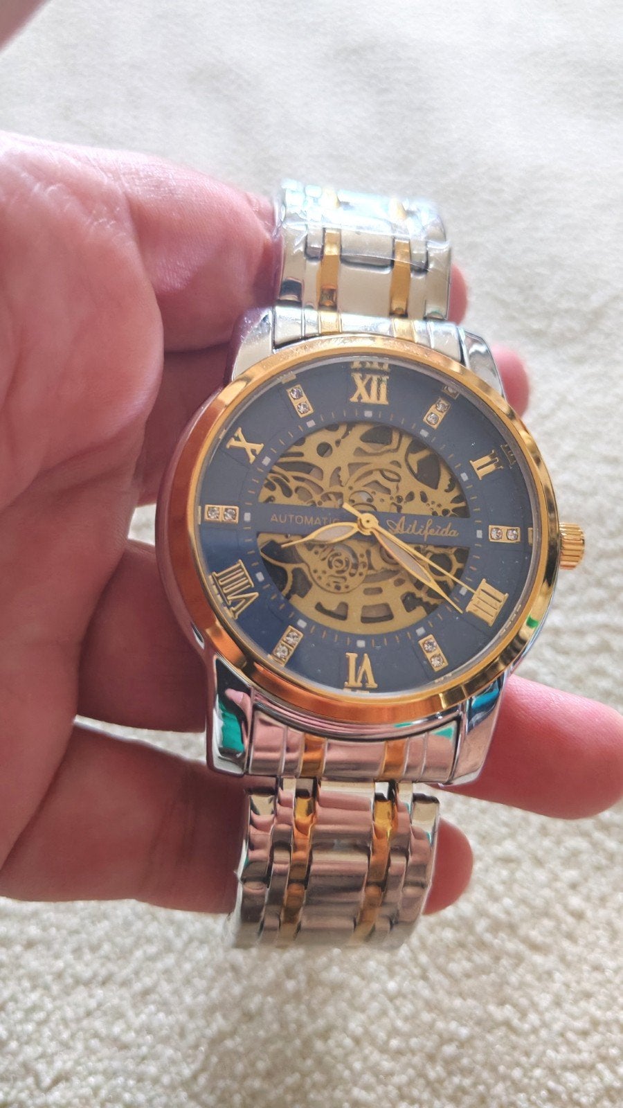 Montre automatique squelette Adifeida — Bicolore argent/doré, Handtassen en Accessoires, Verzenden, Nieuw, Blauw