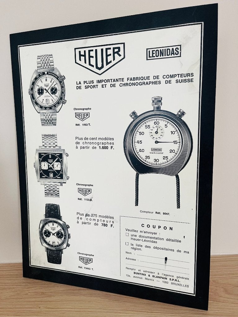 Vintage Heuer / Leonidas horloge reclame affiche - bord, Enlèvement ou Envoi, Utilisé, Panneau publicitaire