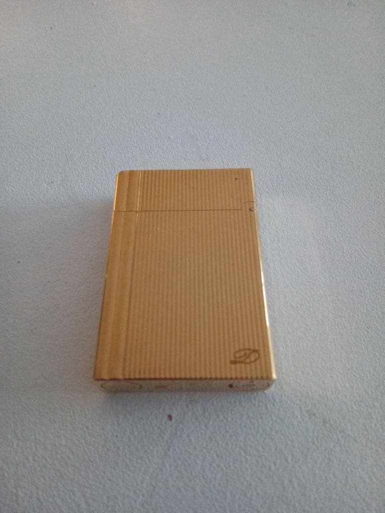 Briquet or Dupont, Enlèvement, Briquet