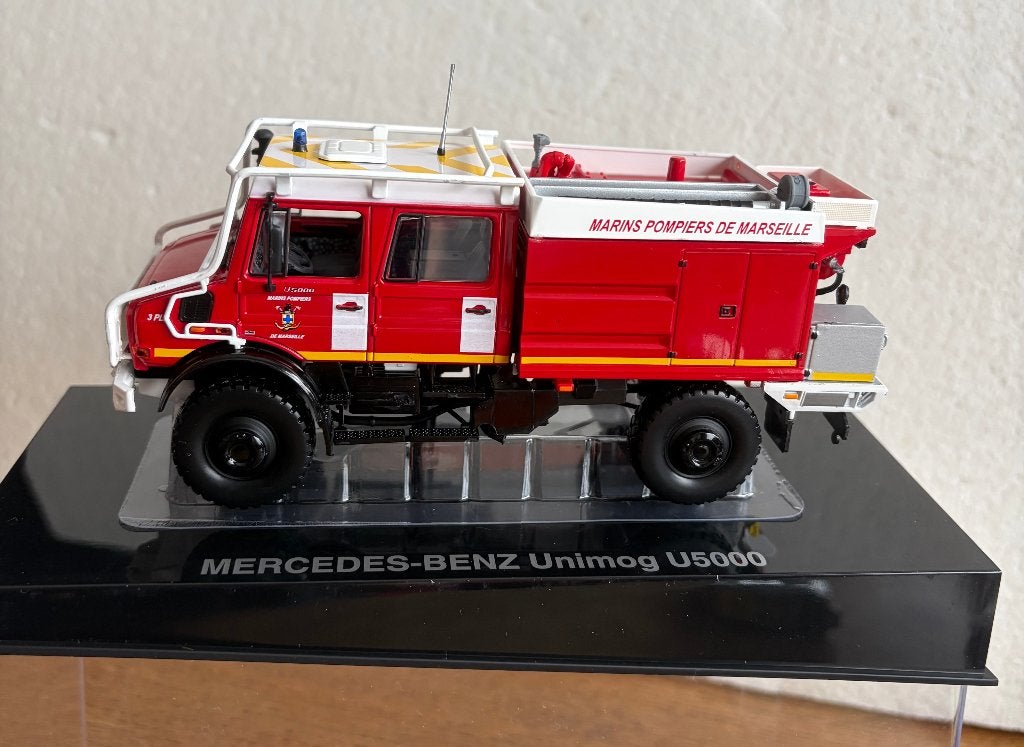 MERCEDES-BENZ - UNIMOG - MARINS POMPIERS DE MARSEILLE - 1:43, Envoi, Neuf, Bus ou Camion, Norev