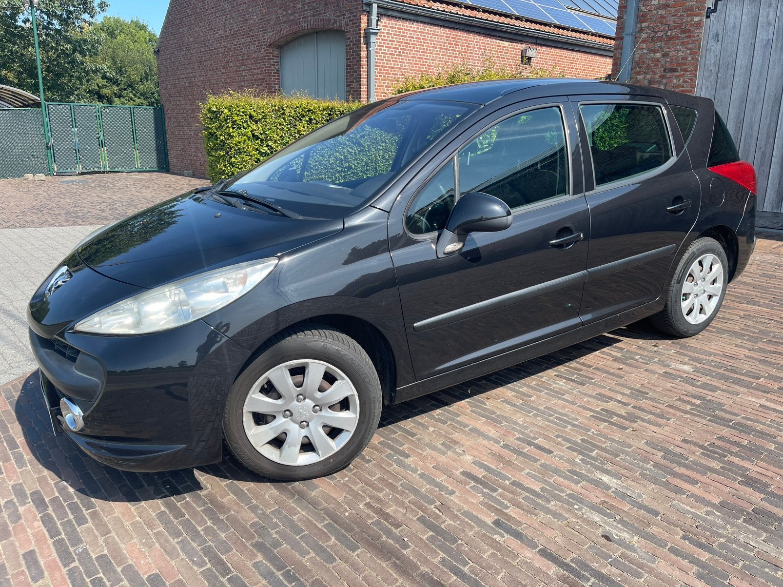 207 SW 1.4i Panodak/AIRCO!!!!!!, Auto's, Stof, Zwart, 4 cilinders, Zwart