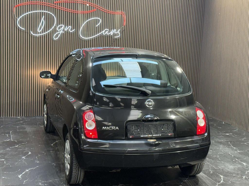 Nissan Micra 1.2i 16v Acenta (bj 2006), Stof, Gebruikt, 4 cilinders, Zwart