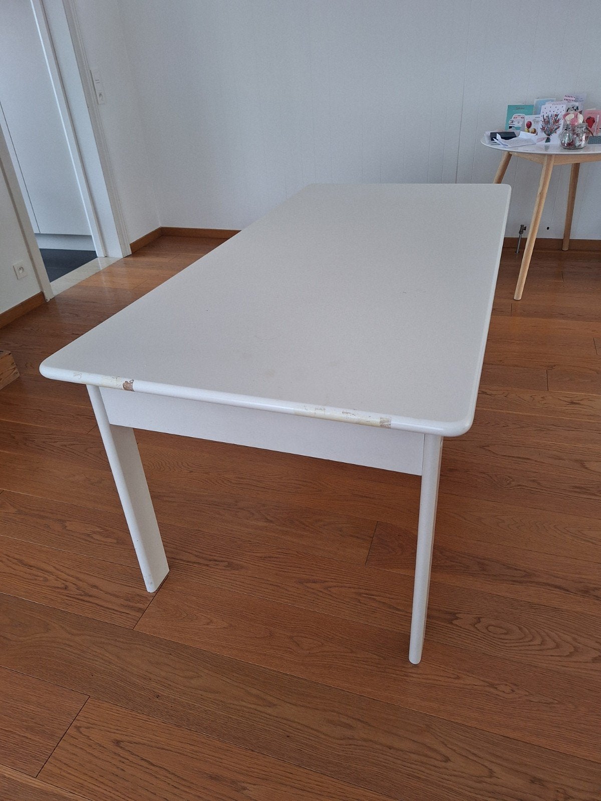 houten witte tafel, Ophalen
