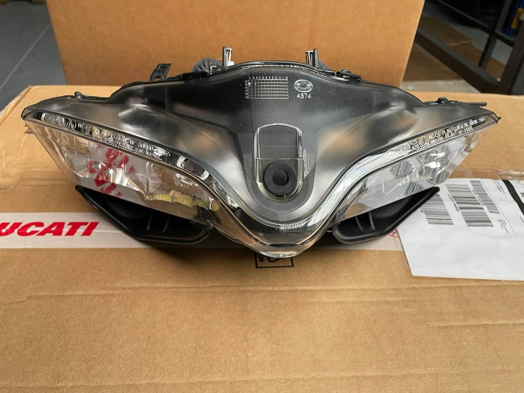 Koplamp Ducati 899/1199 nieuw, Motoren, Ophalen of Verzenden, Nieuw