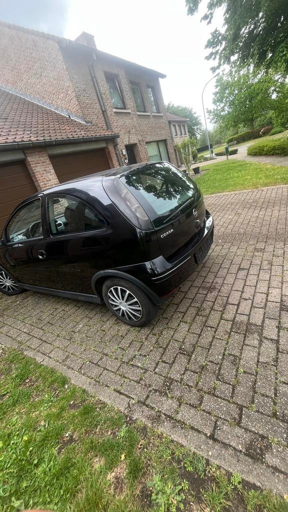 Opel corsa 1.2 gekeurd voor verkoop, Auto's, Zwart, Bedrijf, Elektrische buitenspiegels, Euro 4