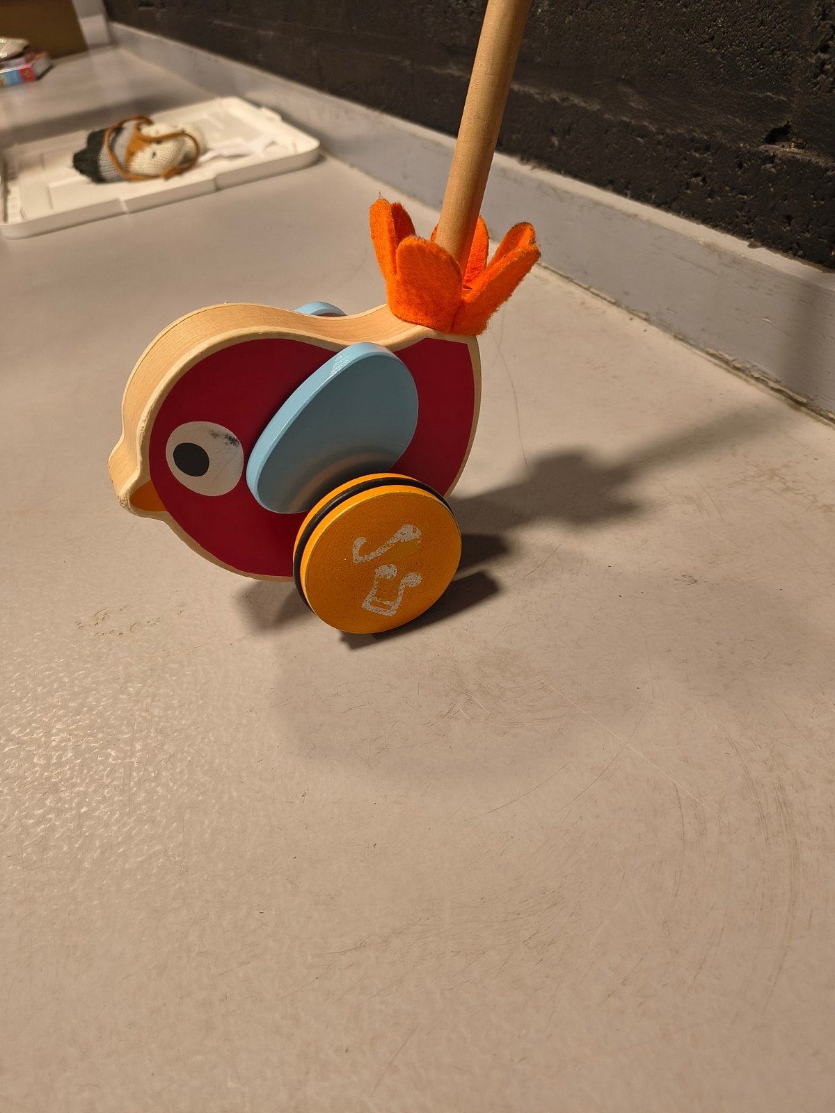 Vogeltje duwstok met muziek, Ophalen