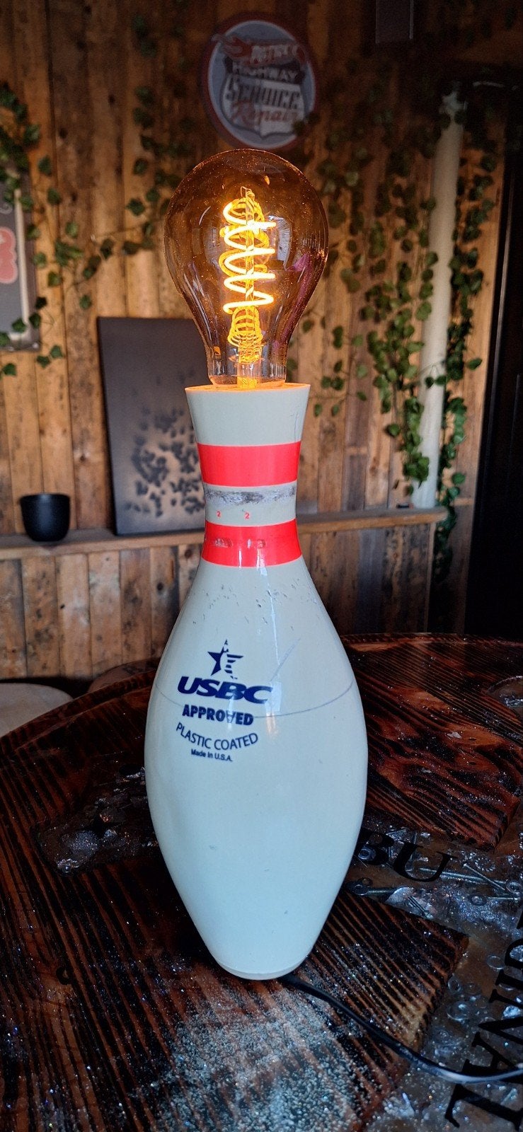 Bowlingpin lamp, Ophalen