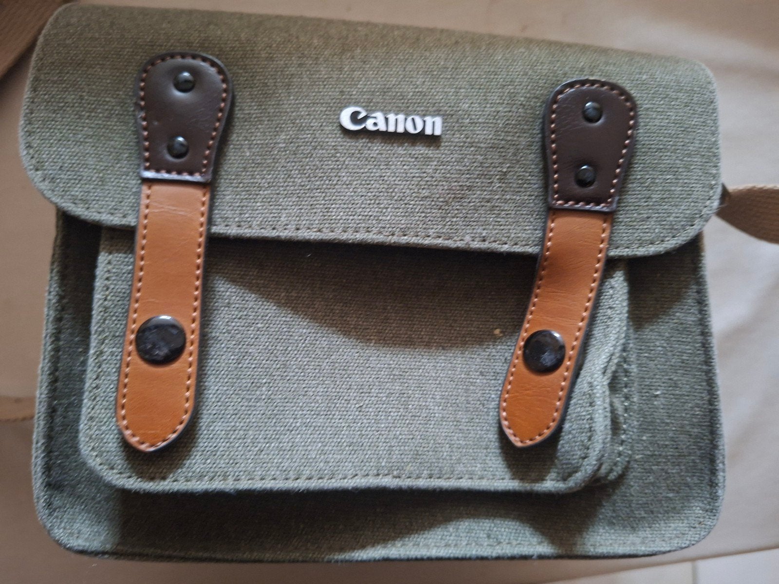 Te koop: Canon schoudertas / cameratas – groen canvas, Audio, Tv en Foto, Foto | Cameratassen, Canon, Ophalen of Verzenden, Voorvak