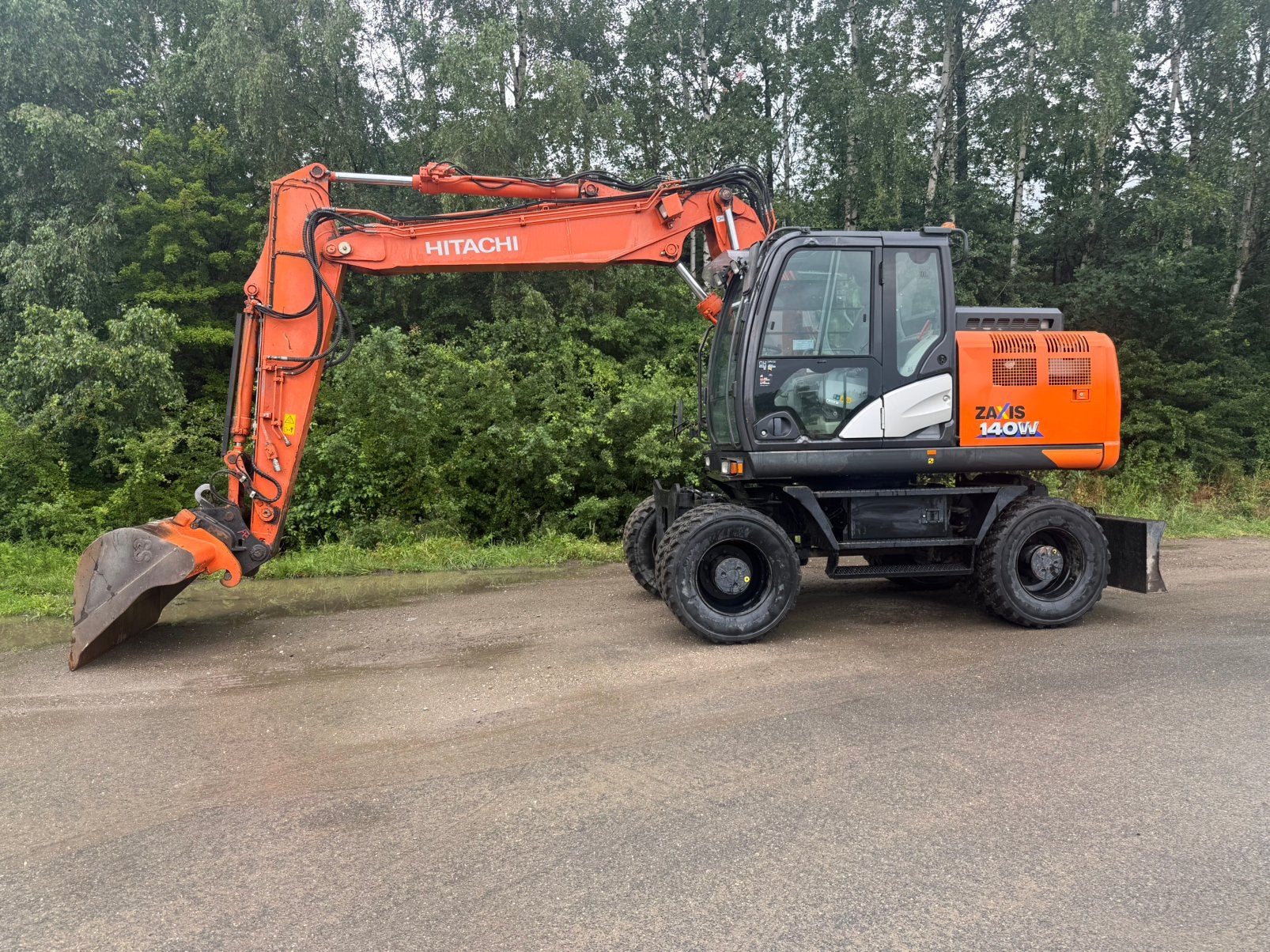 Bandenkraan hitachi zx140-6, Enlèvement