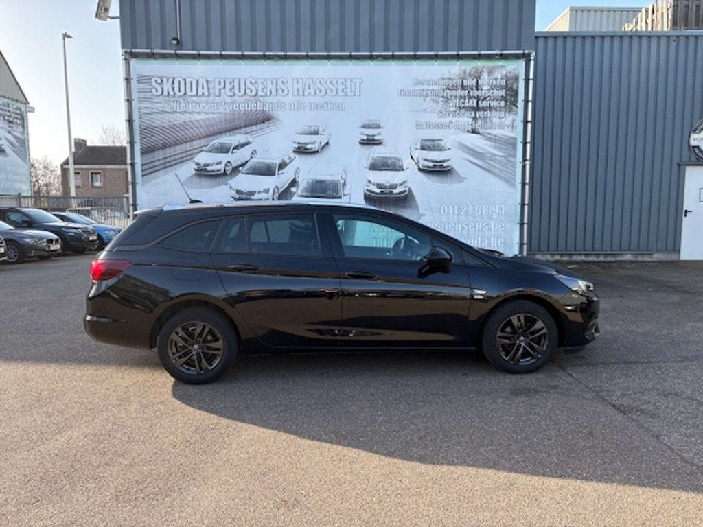 Opel Astra Sports Tourer 1.2 Turbo Edition 2020 S/S, Auto's, Opel, Stof, Gebruikt, Overige kleuren, https://public.car-pass.be/vhr/bf598b0a-9170-40d7-967d-5e5523198363