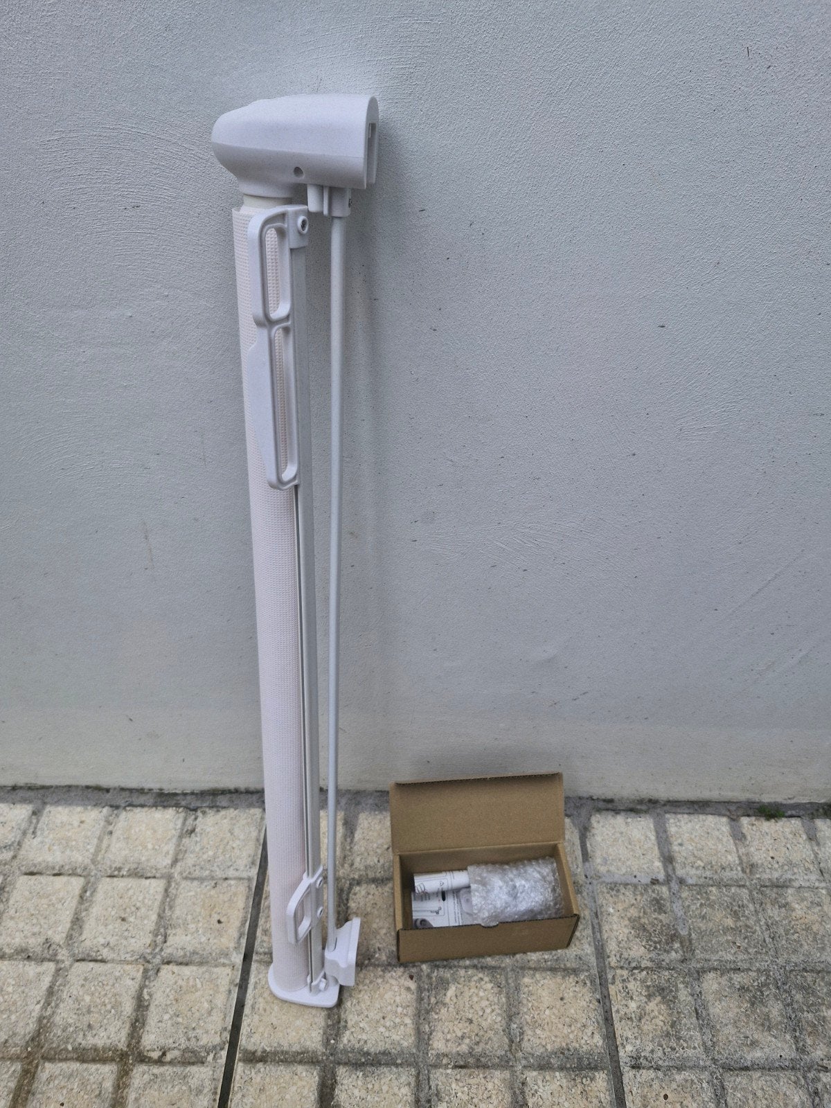 porte rétractable neuve à donner, Enlèvement
