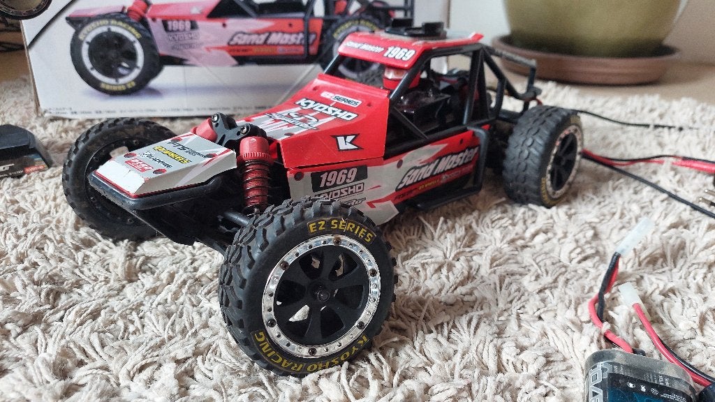 Originele Kyosho Sand Master EZ Series telegeleide auto, Hobby & Loisirs créatifs, Autres échelles, Voiture off road, Enlèvement