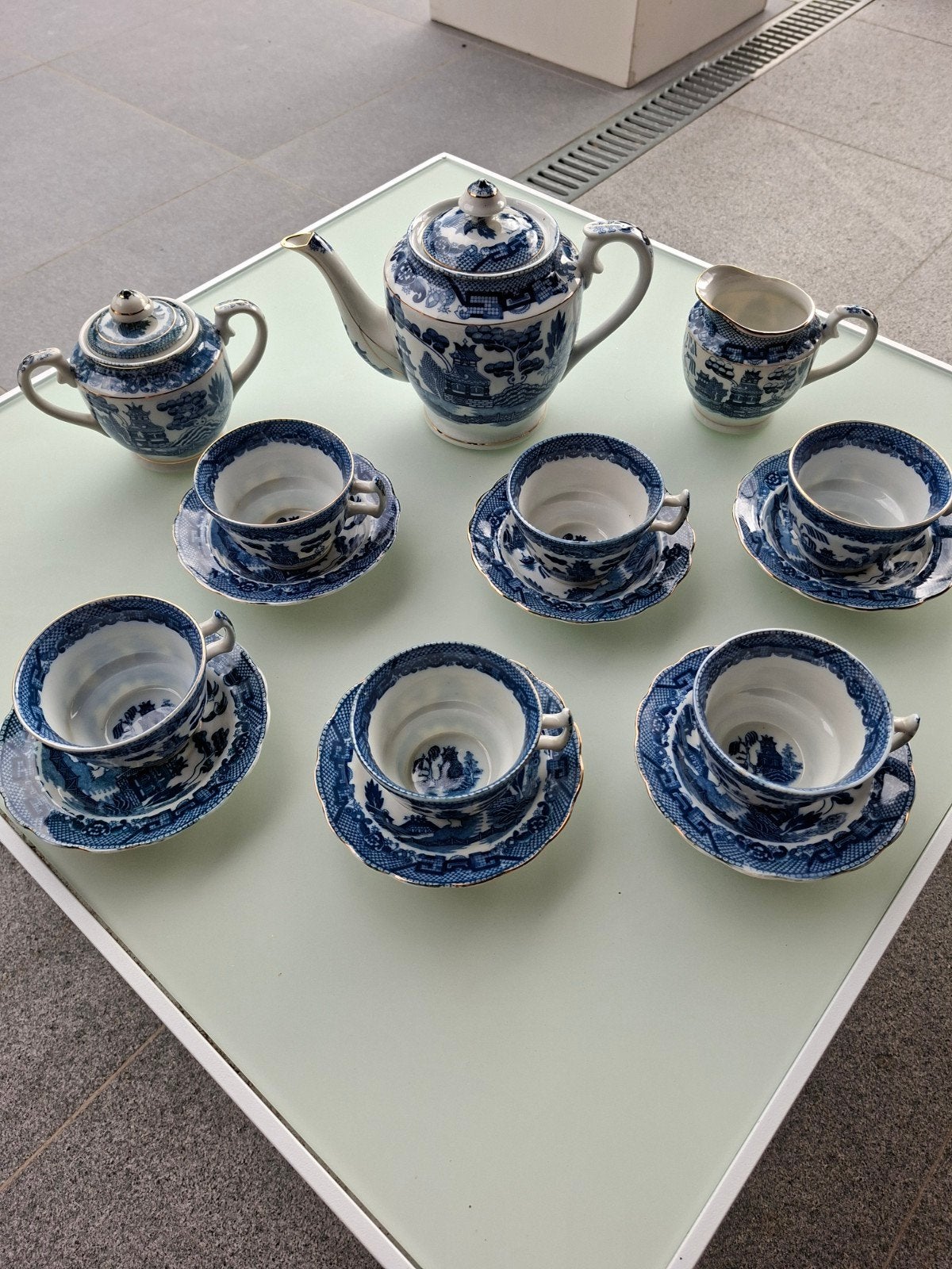 Porseleinen theeservies in Blue Willow‑stijl., Ophalen of Verzenden
