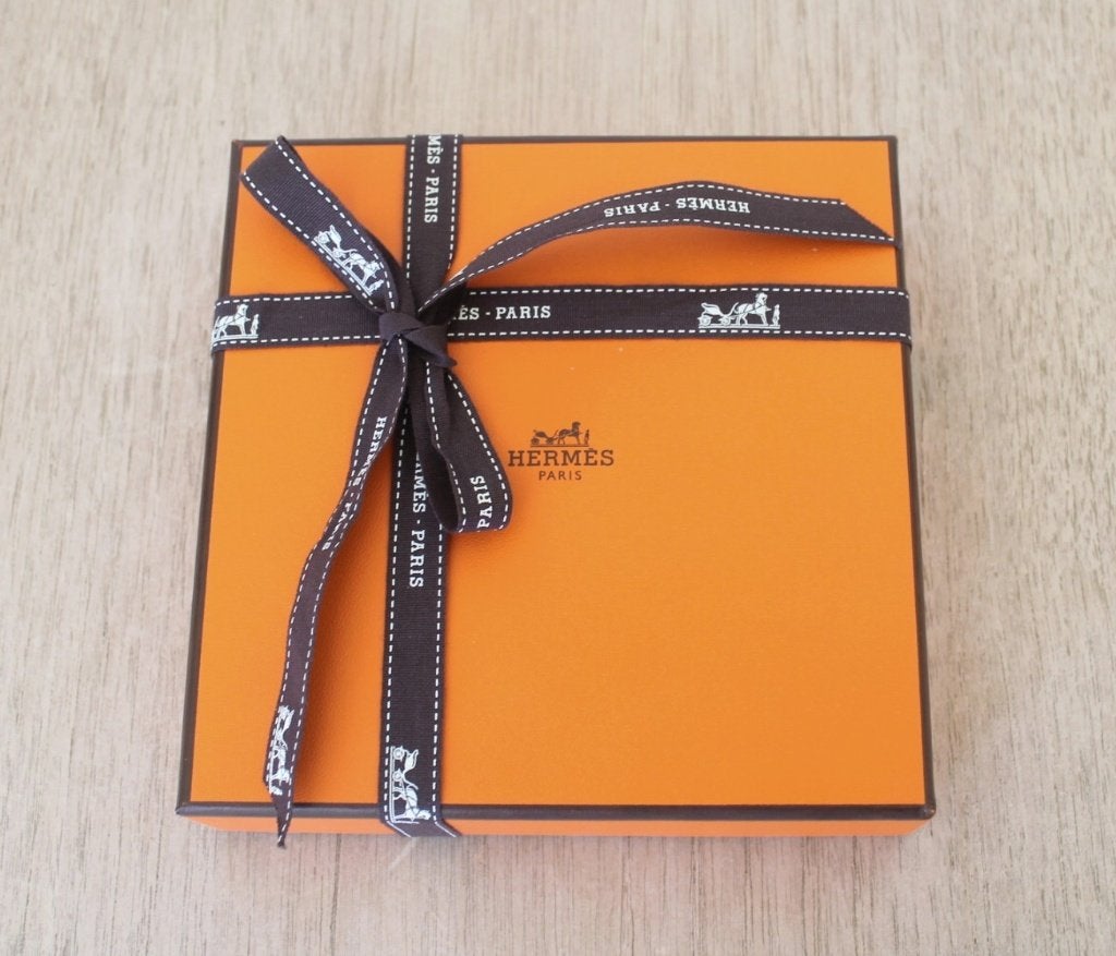 Coffret Hermès 'Les Miniatures' +bolduc + Grigri Rodeo inlay, Enlèvement ou Envoi, Neuf, Emballage