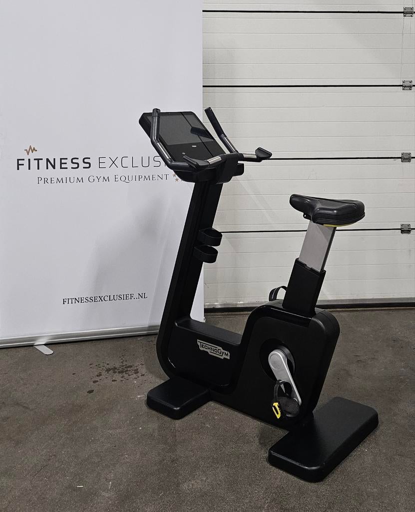 Technogym Artis Bike met Unity 3 Live display – Upright Bike, Sport en Fitness, Ophalen, Gebruikt, Benen, Overige typen
