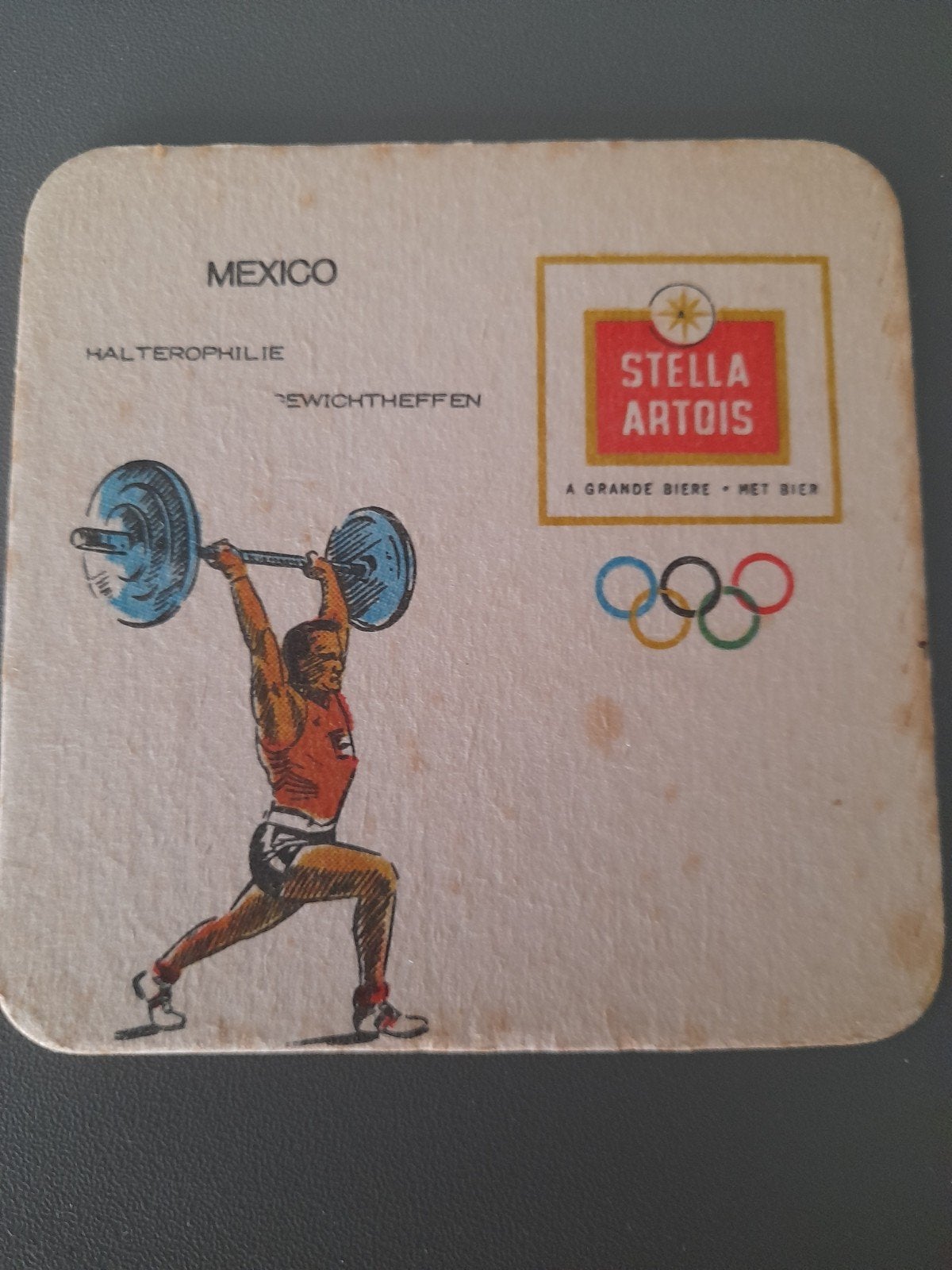 Tapis à bière Stella Artois pour les Jeux Olympiques de 1968, Enlèvement ou Envoi, Stella Artois