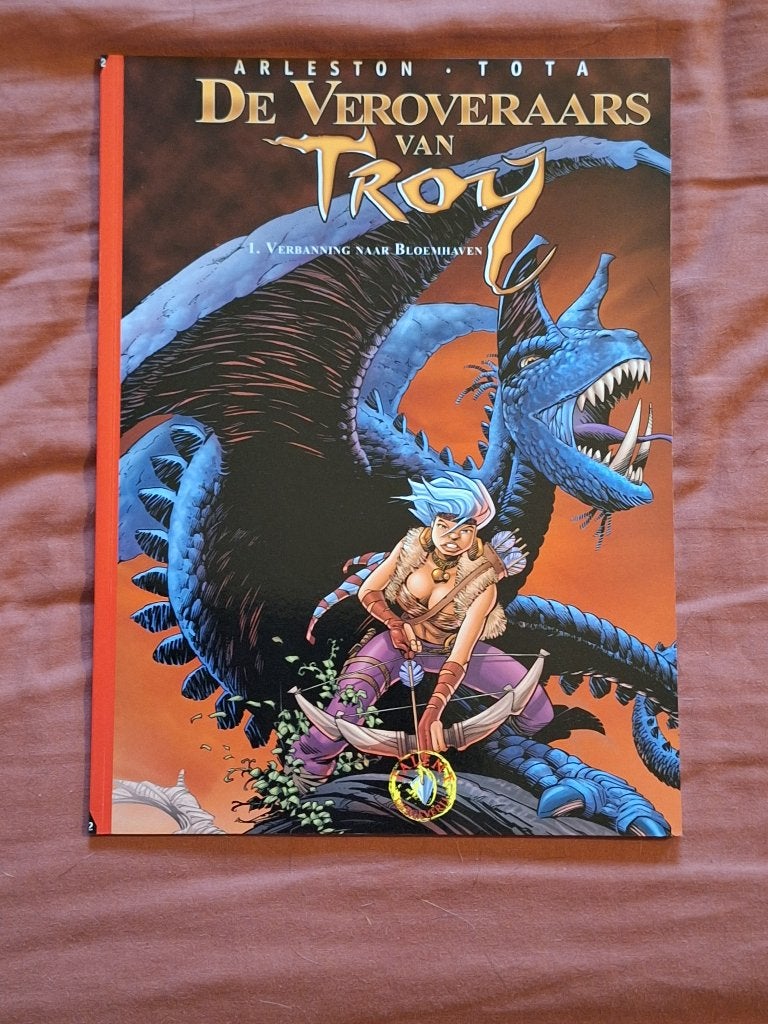 de veroveraars van Troy 1: verbanning naar Bloemhaven, Eén stripboek, Ophalen of Verzenden, Nieuw