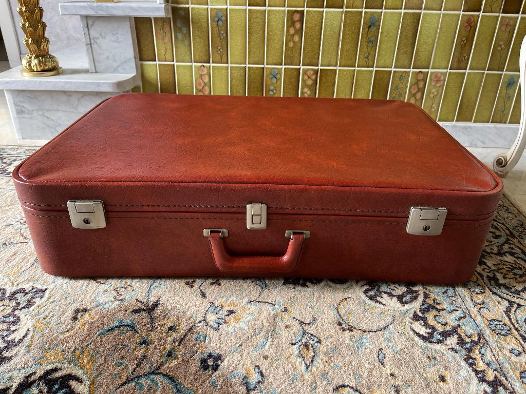 Vintage reiskoffer, Ophalen