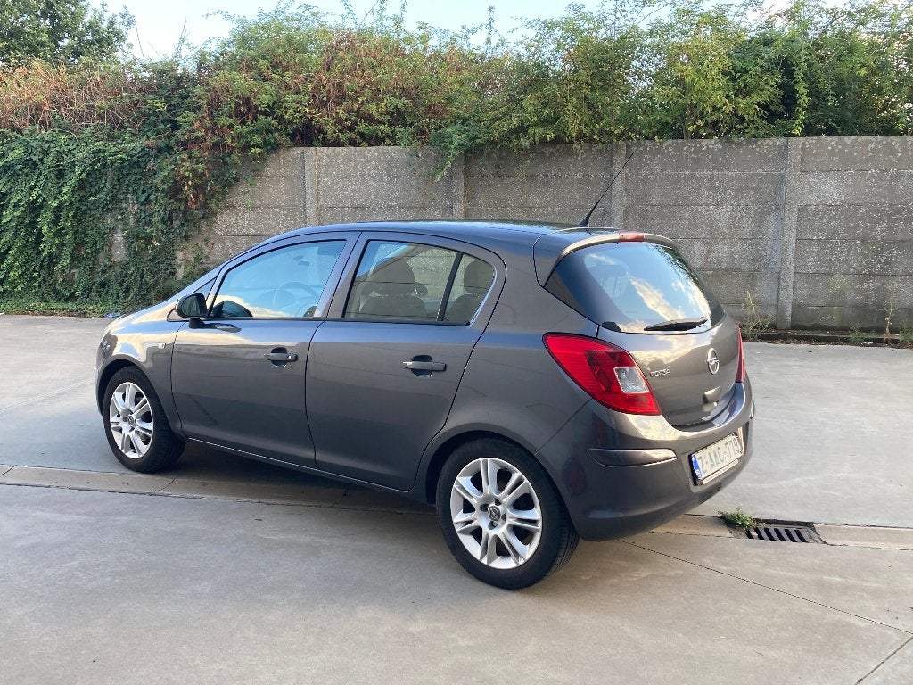 Opel Corsa 1.2benzine 2011 met 122000km*AIRCO*GARANTIE*EURO5, Auto's, Opel, Euro 5, Stof, 63 kW, 4 cilinders