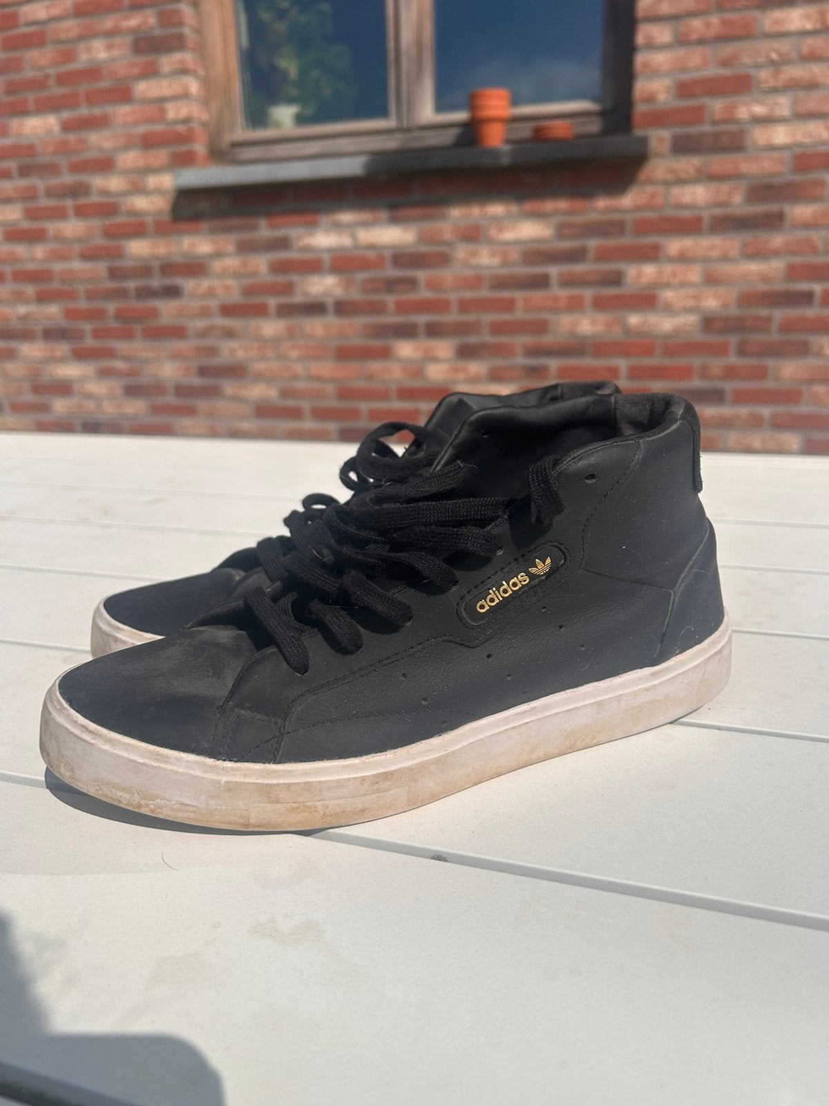 zwarte adidias sneakers in leer - maat 40, Kleding | Dames, Schoenen, Ophalen, Zo goed als nieuw, Sneakers