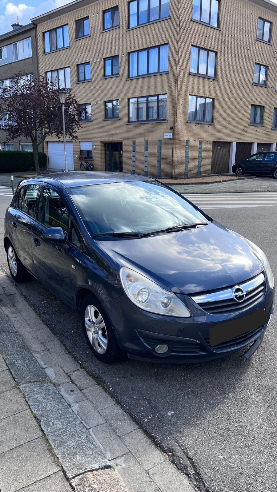 Opel corsa 1.2 benzine bouwjaar 2009 km 208.000, Auto's, Stof, Zwart, Blauw, Elektrische ramen