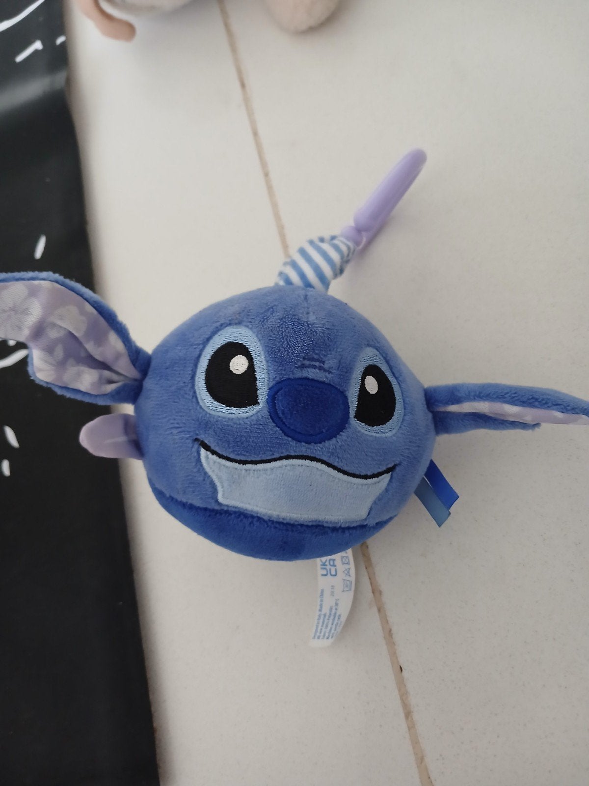 Stitch babyspeelgoed, Ophalen