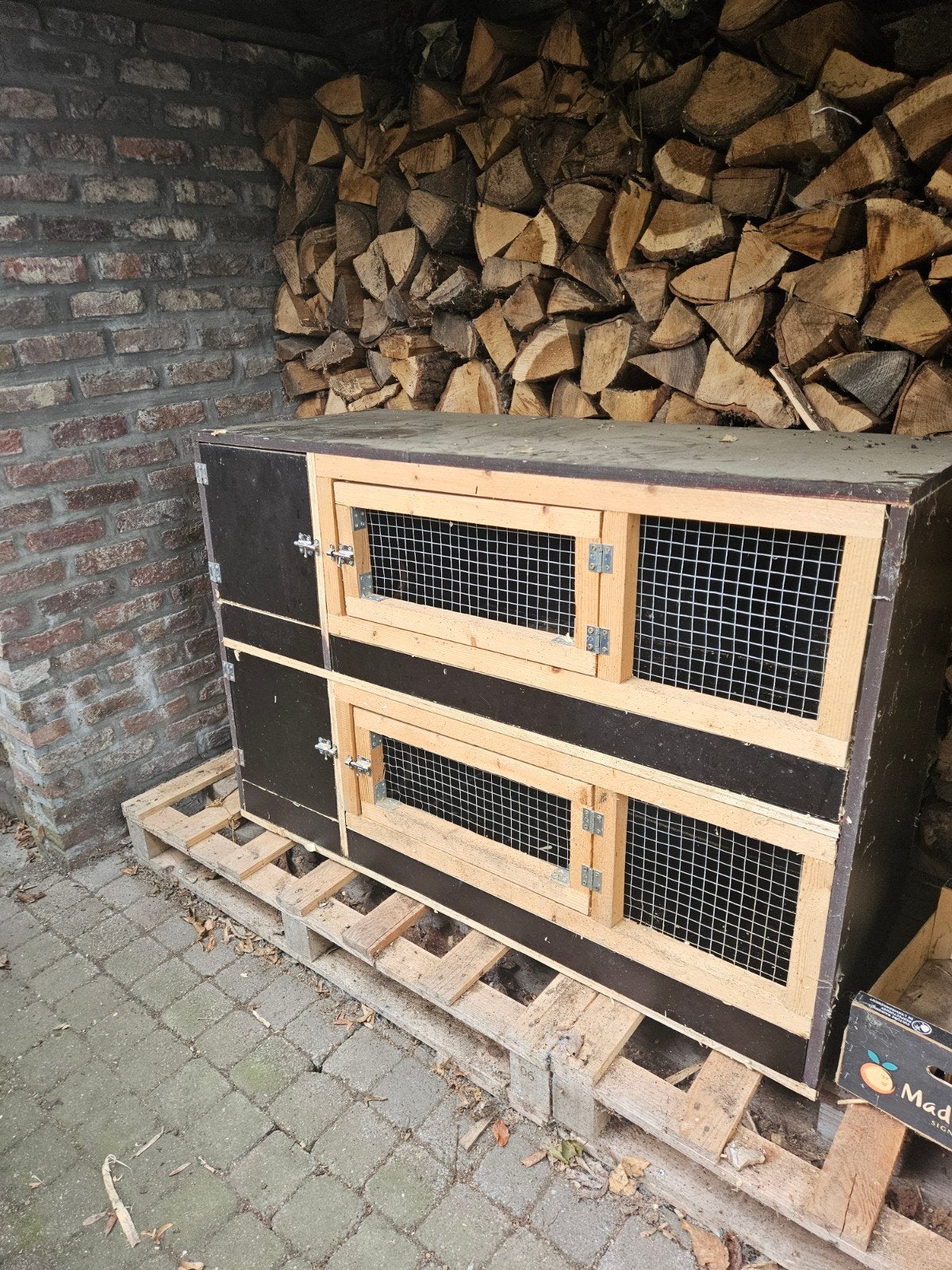 Houten knaagdierenkooi., Enlèvement