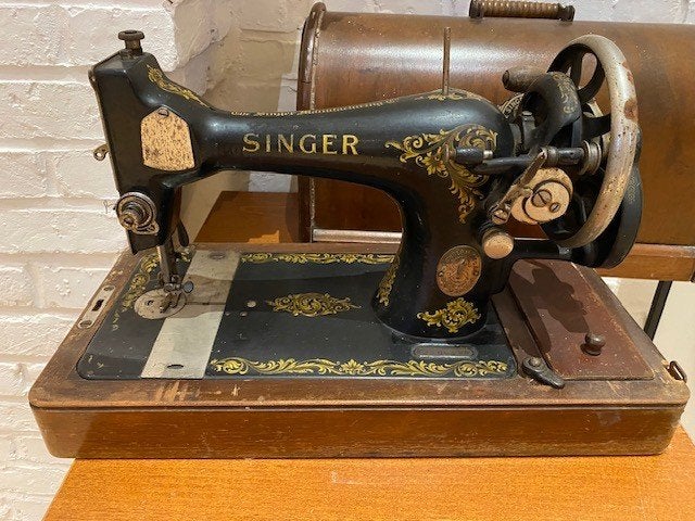 Machine à coudre Singer ancienne, Enlèvement