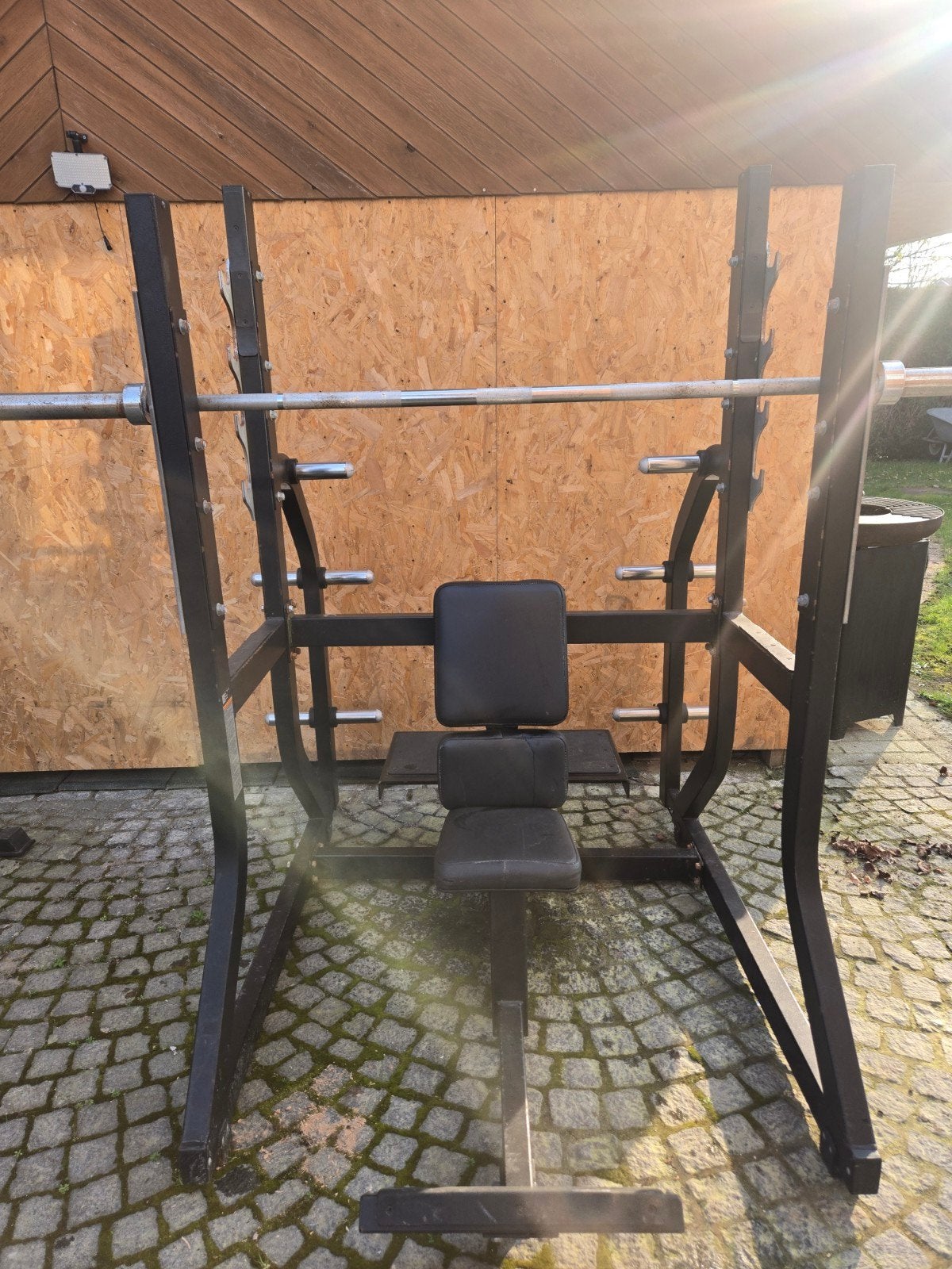 Technogym olympic Military Bench press met olympic bar, Ophalen