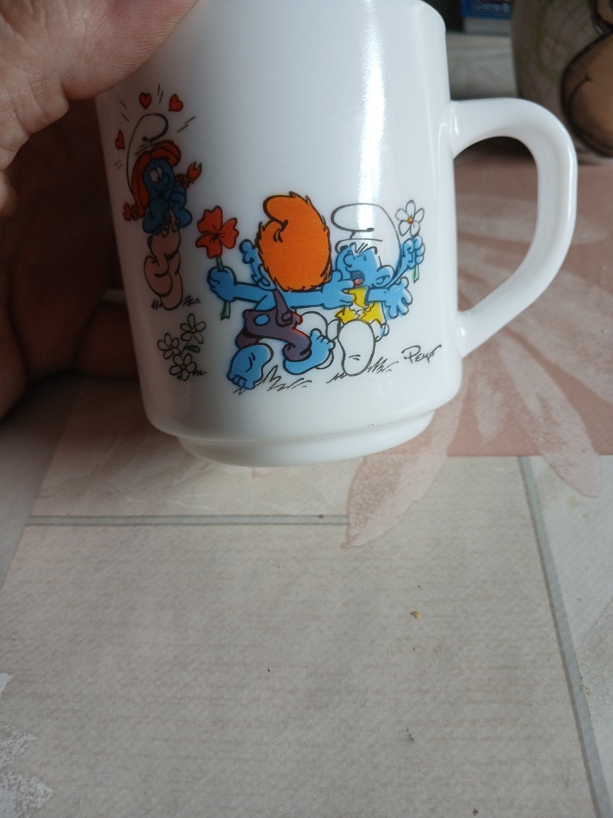 Tas/mok van de alle bekende smurfen, Ophalen