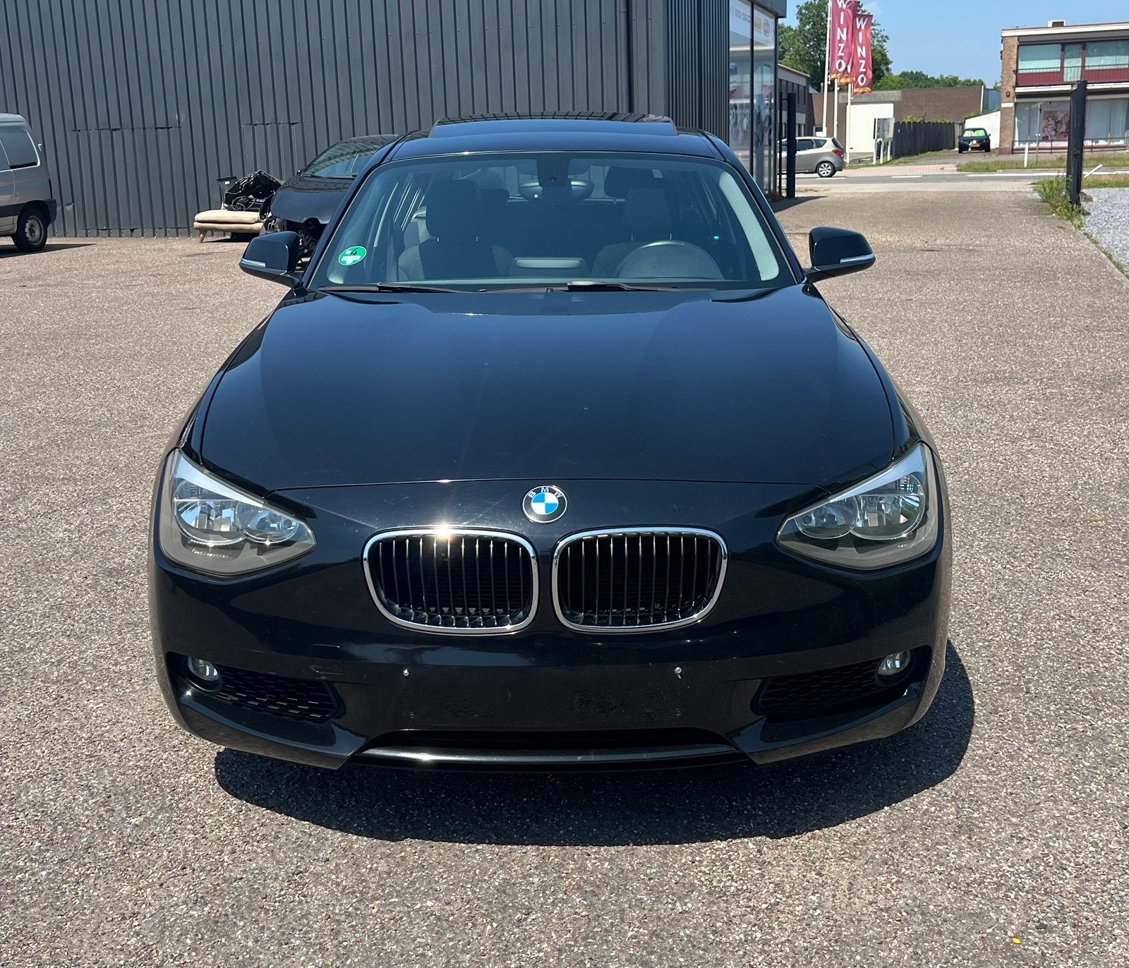 BMW 116i F20 136 pk benzine 2012 Airco GARANTIE, Auto's, Euro 5, Zwart, Zwart, Bedrijf