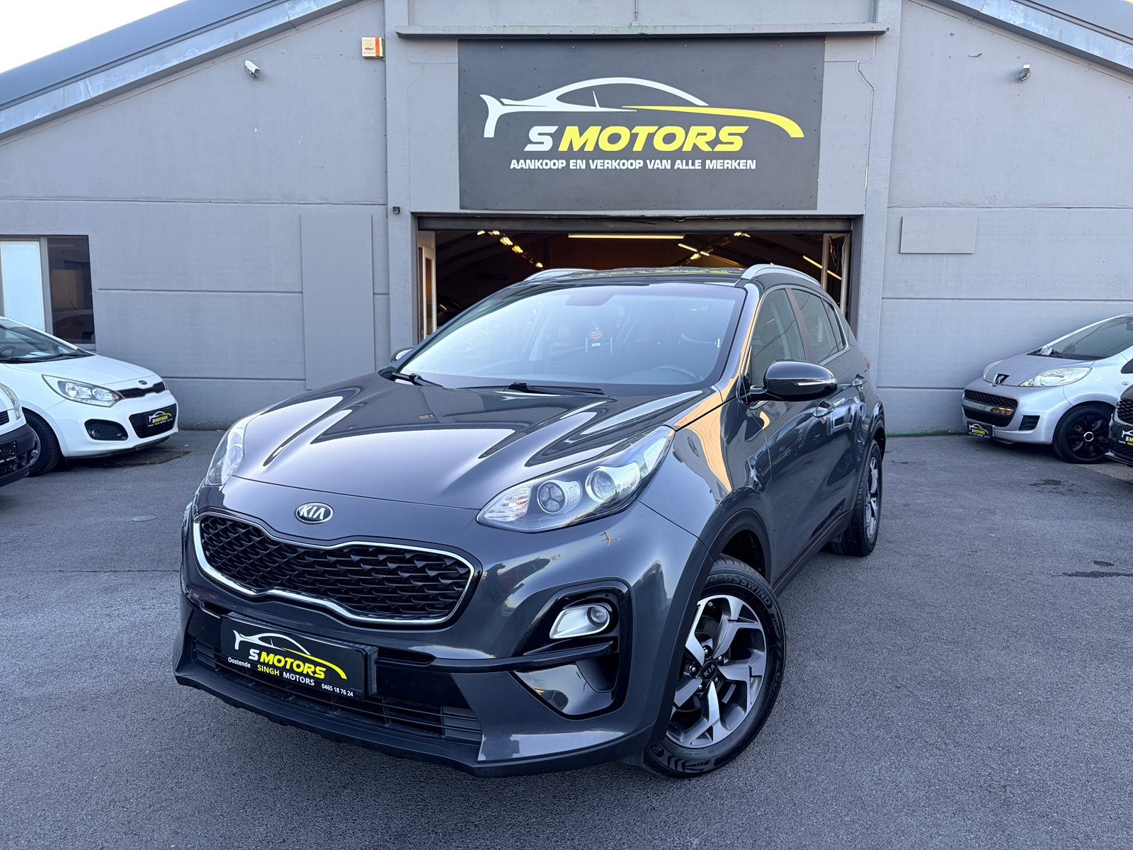 Kia Sportage 1.6i | Airco | Cruise | Gps | Camera | GARANTIE, Auto's, Dealer onderhouden, Stof, 5 deurs, 97 kW