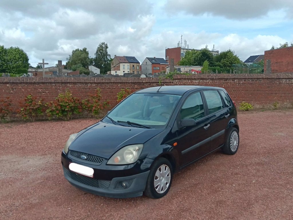 ford fiesta 1.4 TDCI 68 Ch 2008 Euro 4 Facelift, Auto's, Ford, Voorwielaandrijving, Dealer onderhouden, Stof, Zwart