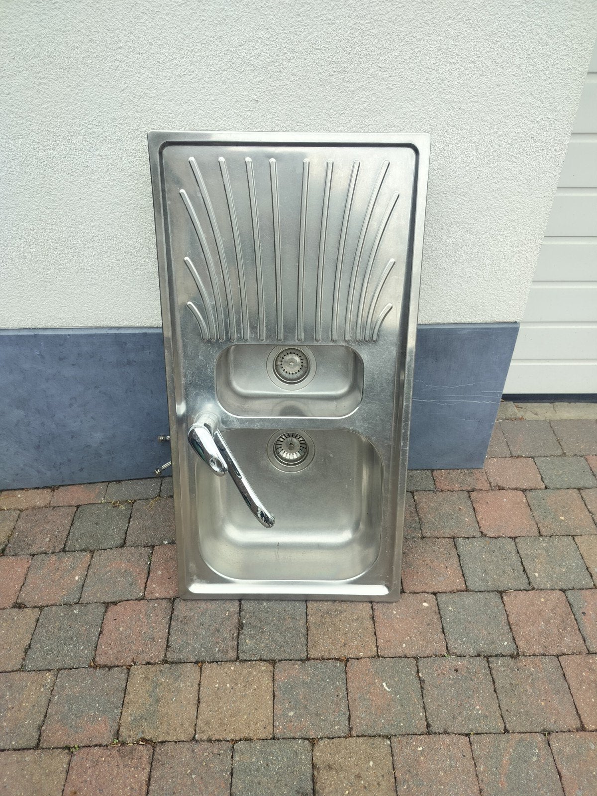 keuken spoelbak, Ophalen
