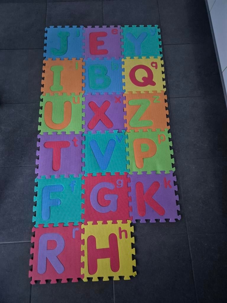 17 foam speeltegels, Enlèvement